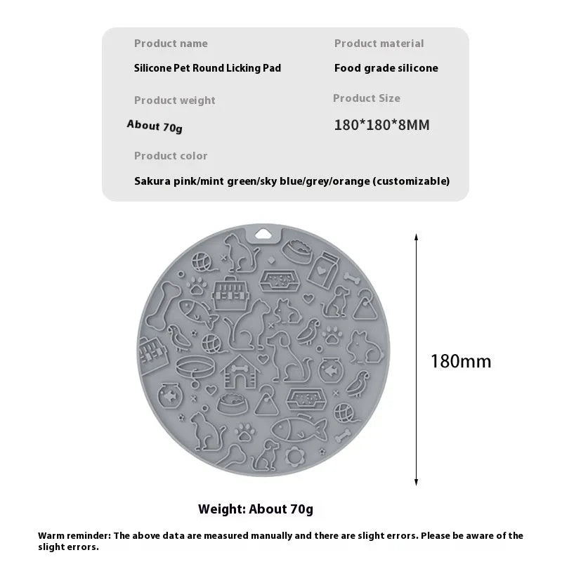 Round silicone pet licking mat with suction cups on a flat surface.
