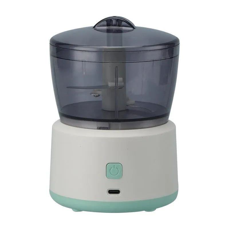 Mini electric meat grinder in white or light green with transparent 225ml cup and stainless steel blades