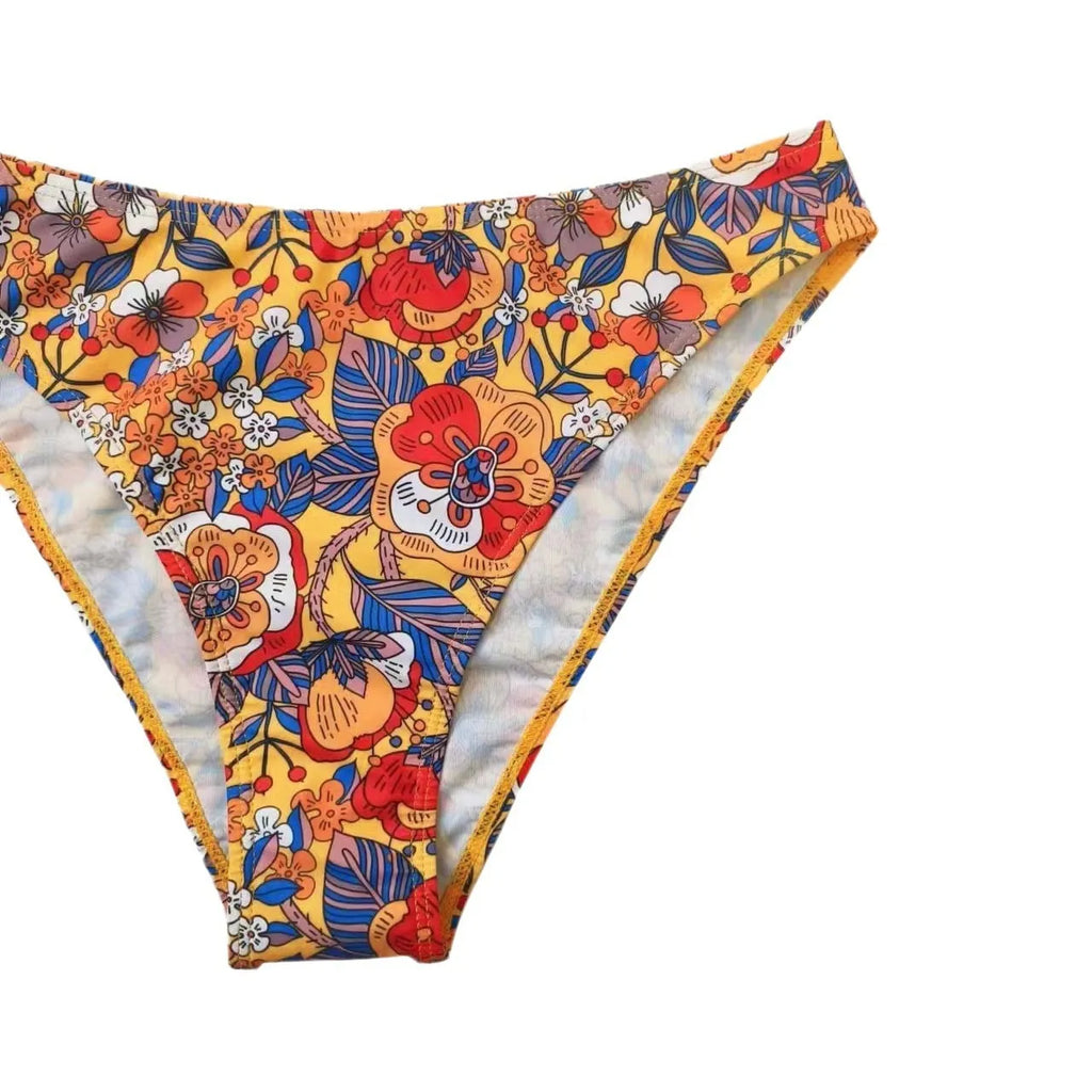 Plus size floral print women's bikini swimsuit with adjustable straps.