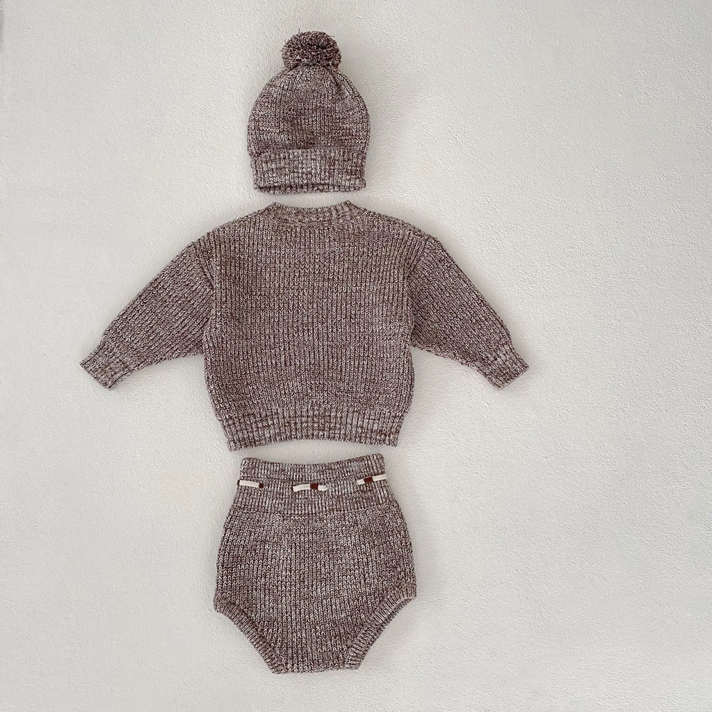 Dark brown baby girl three-piece clothing set with knitted hat, blouse and shorts