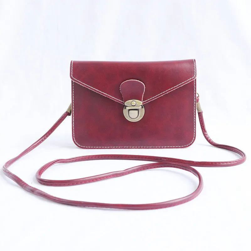 Retro soft surface shoulder messenger bag in cross square shape with flap closure