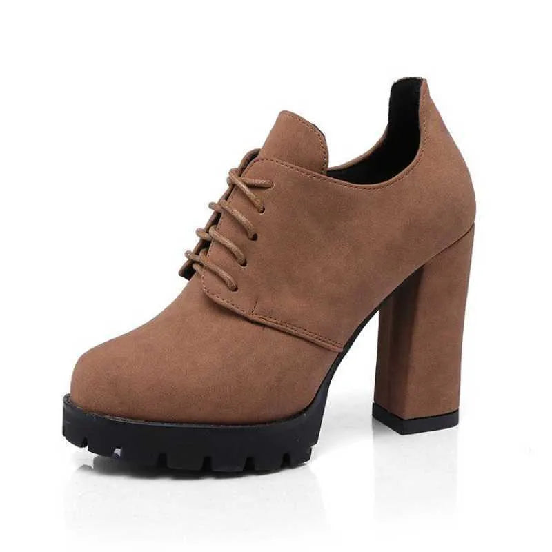 Women's black platform boots with thick heel, PU upper, lace-up front, and round toe