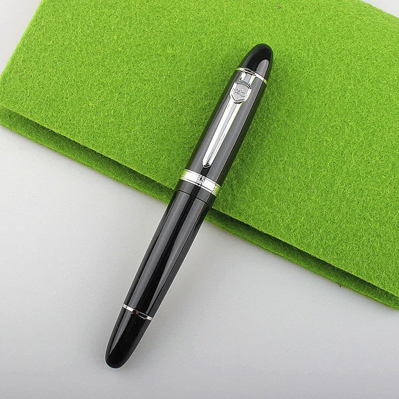 Metal ball pen with pearl round beads and black gold clip on white background