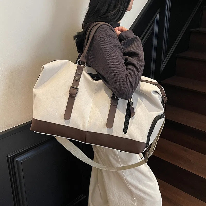 Canvas travel shoulder bag in solid green colour for leisure use