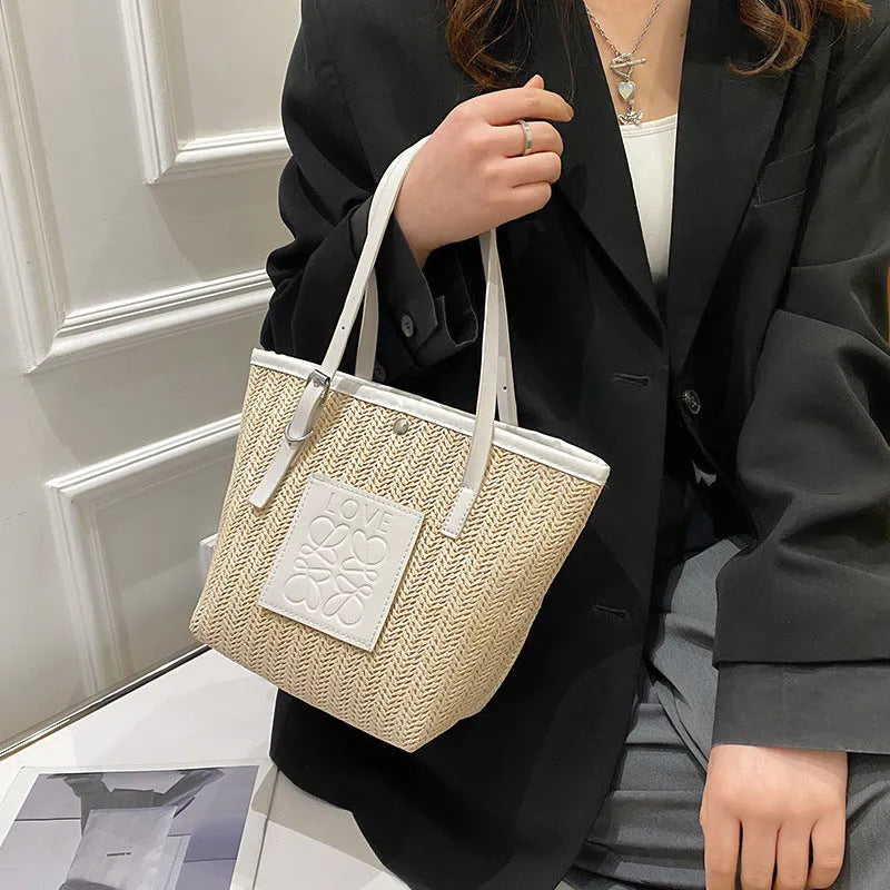 Women's woven straw shoulder bag in European American retro style with three-dimensional pockets