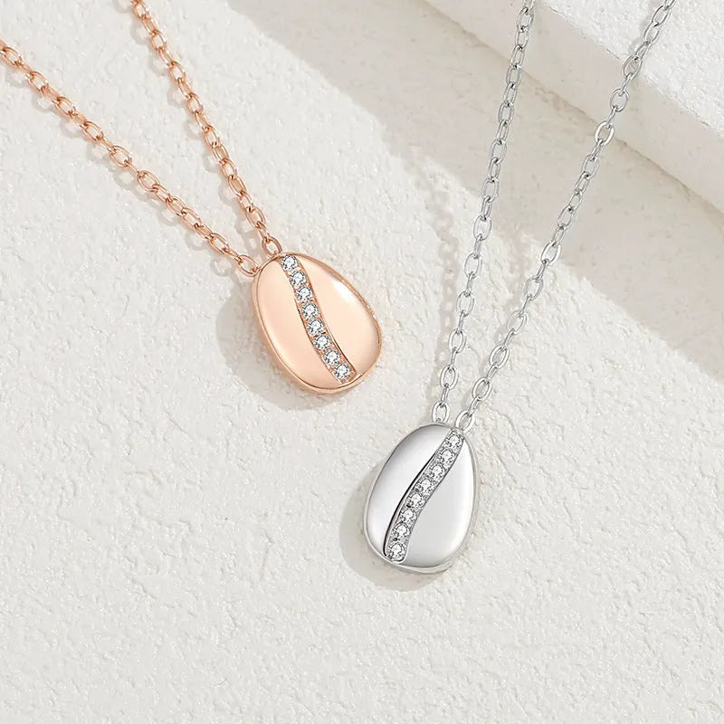 Coffee bean 925 silver necklace with inlaid zircon round pendant on a 41-50cm cross chain in white gold or rose gold colour