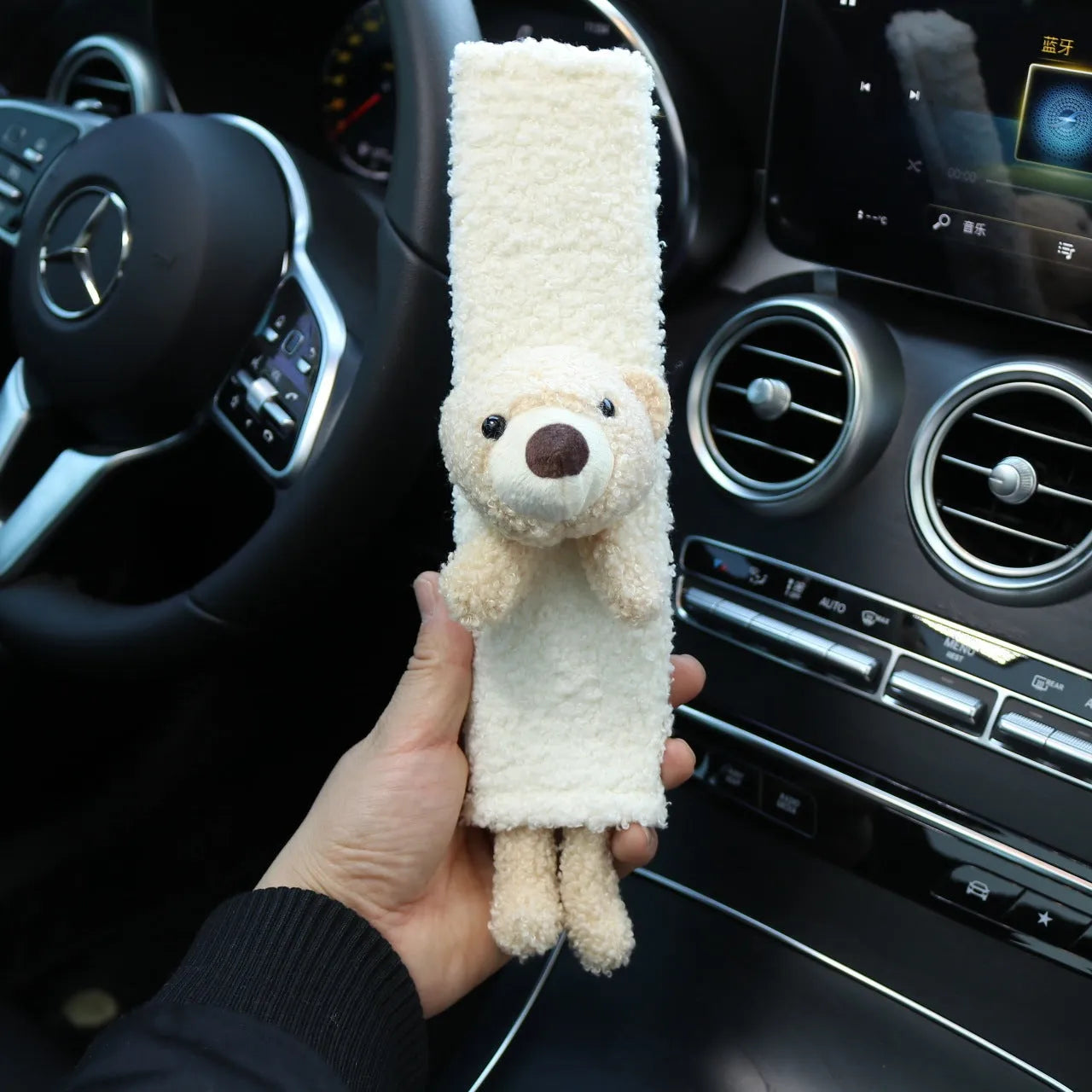 Cartoon plush lamb wool car seatbelt shoulder protector in bear and rabbit designs.