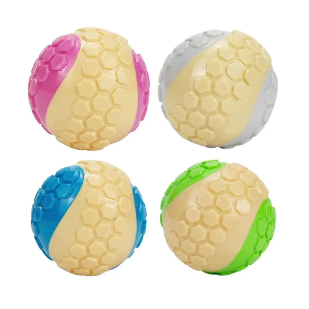 TPR plaid molar dog toy ball in blue, pink, green, and grey colours with textured surface