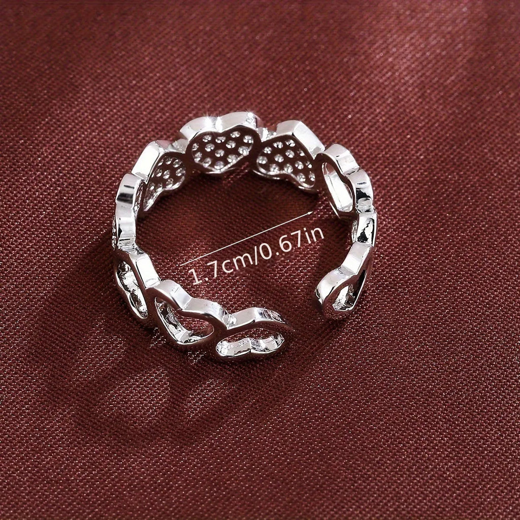 Adjustable couples ring in gold or silver with geometric love heart design