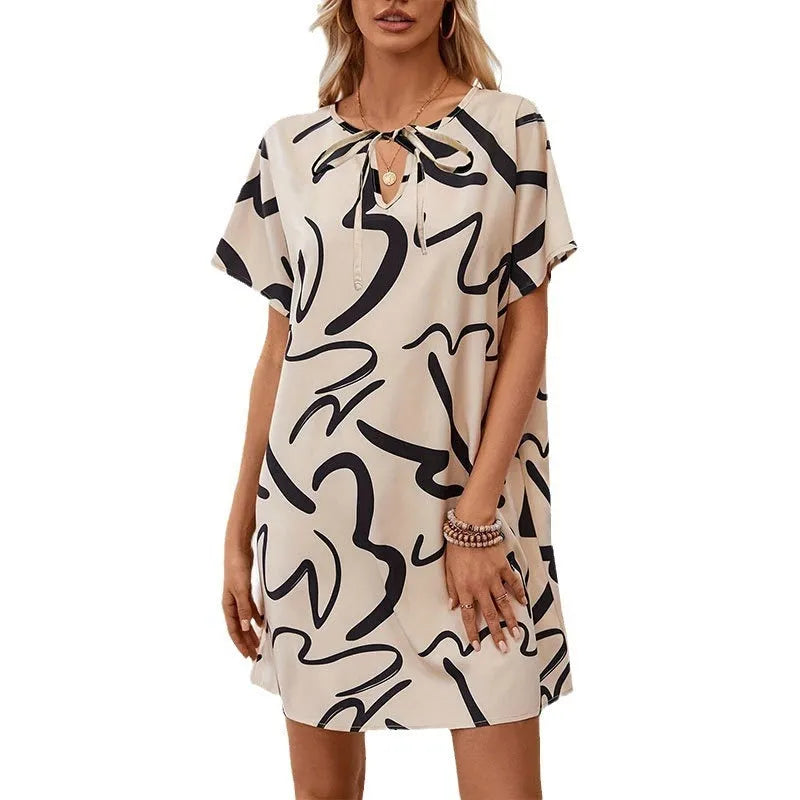 Khaki colour block print stretch polyester pencil dress with raglan sleeves on a model