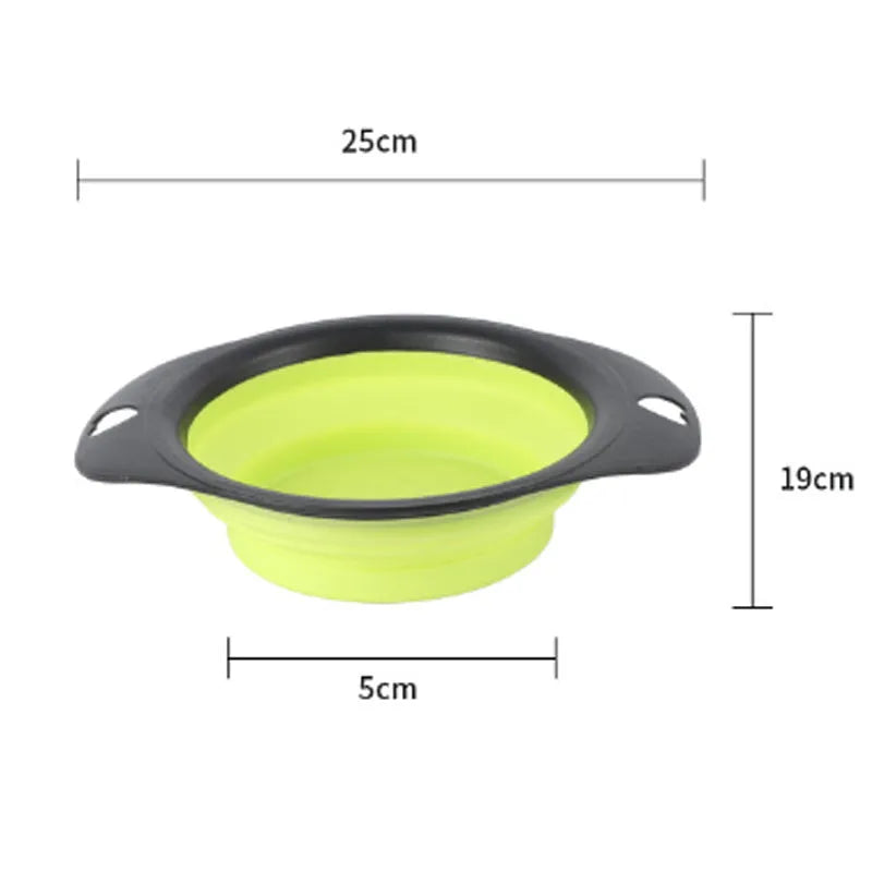 Black silicone pet bowl shown open and folded flat next to a dog leash.