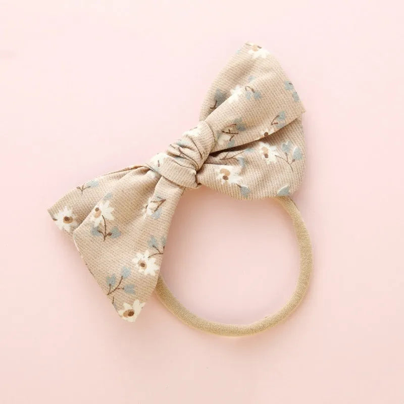 Children's knotted bow hair ring in cloth with Princess series styling