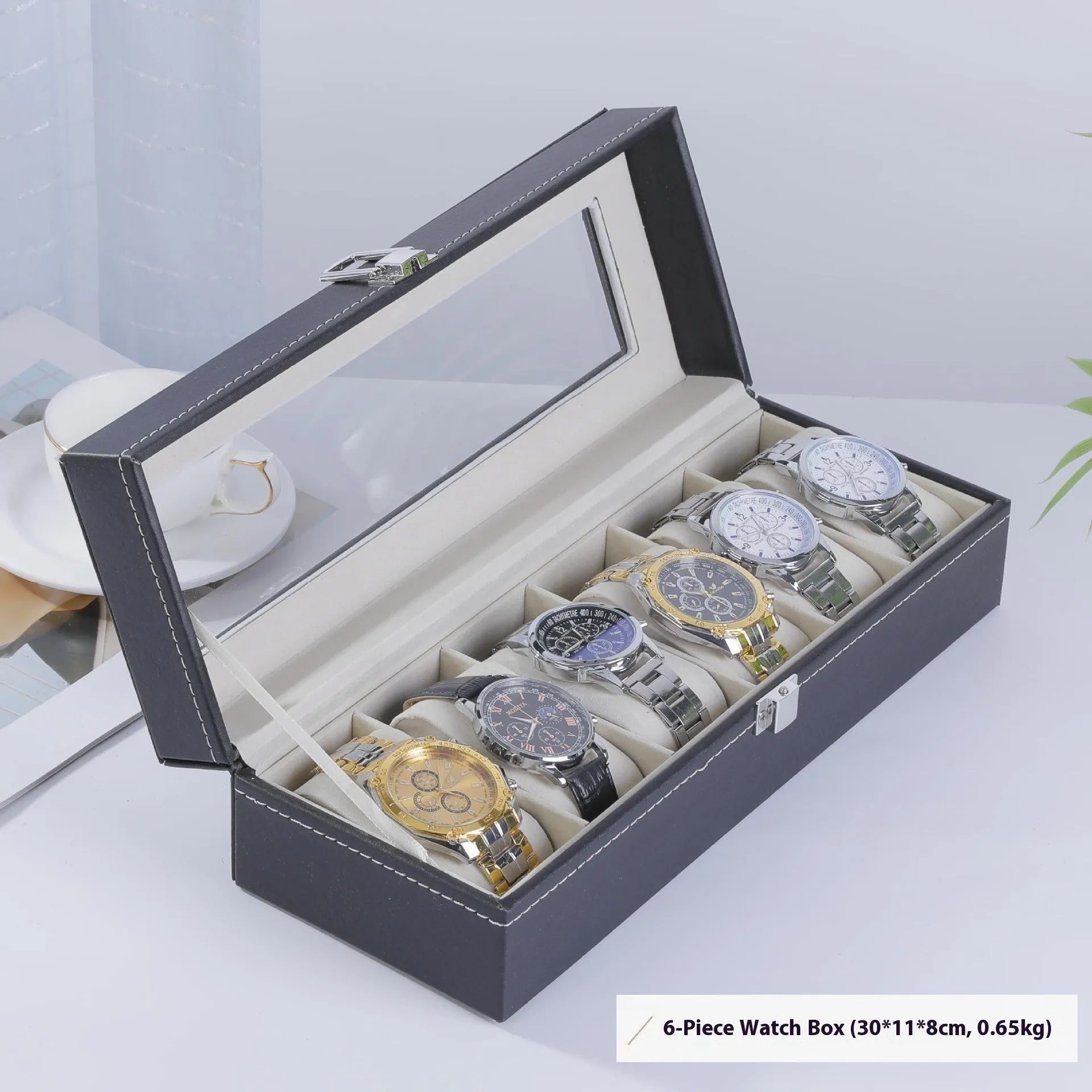 Grey high-grade leather watch storage box with see-through lid showing multiple watch slots.