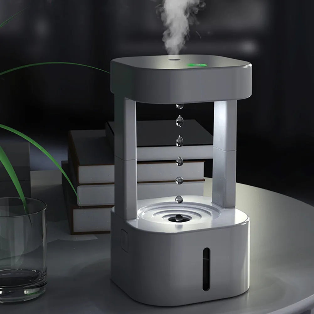 Anti-gravity water drop humidifier with optical illusion water flow and 580ml tank