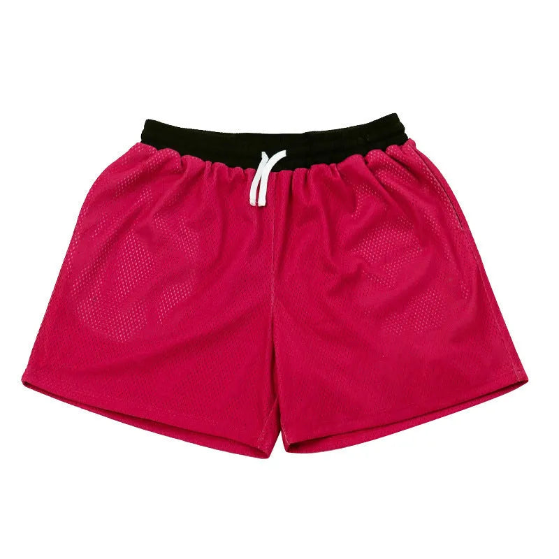 Men's mesh athletic shorts in solid colours with quick-drying fabric for summer workouts