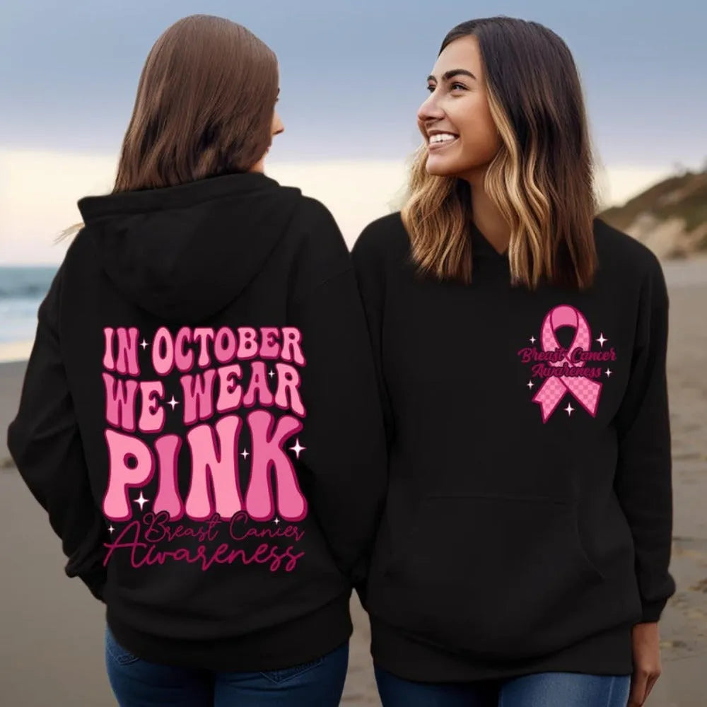 Women's pink breast cancer awareness hoodie with art retro pattern and side seam pockets.