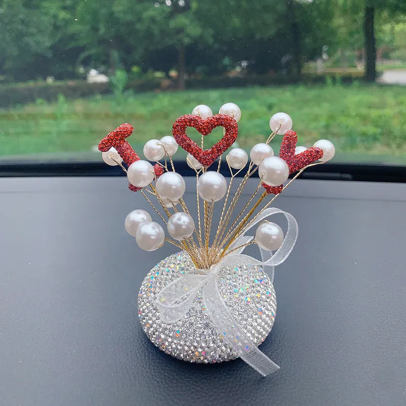 Clay star car decoration ornament for centre console in various red, pink, and pearl white colour designs.