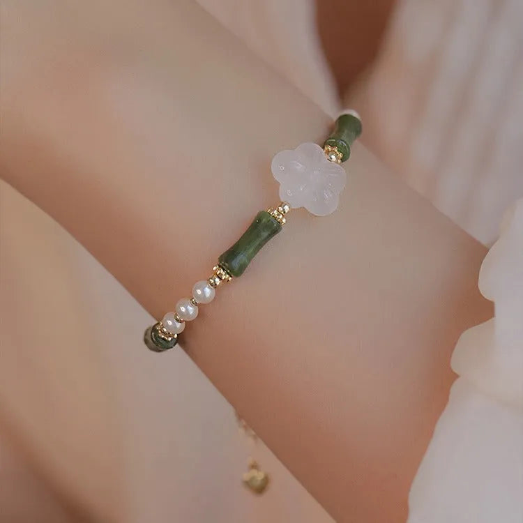 Traditional Chinese bamboo joint bracelet with Hetian jade and copper shell pearls