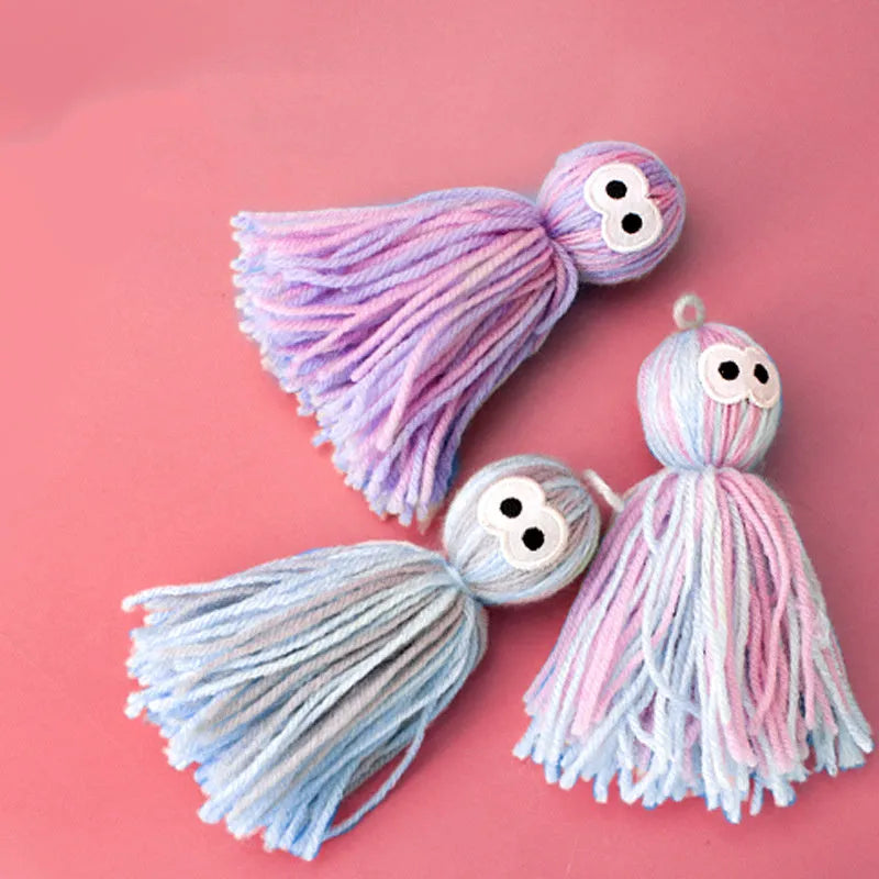Wool ball cat toy with hanging feature in blue grey colour