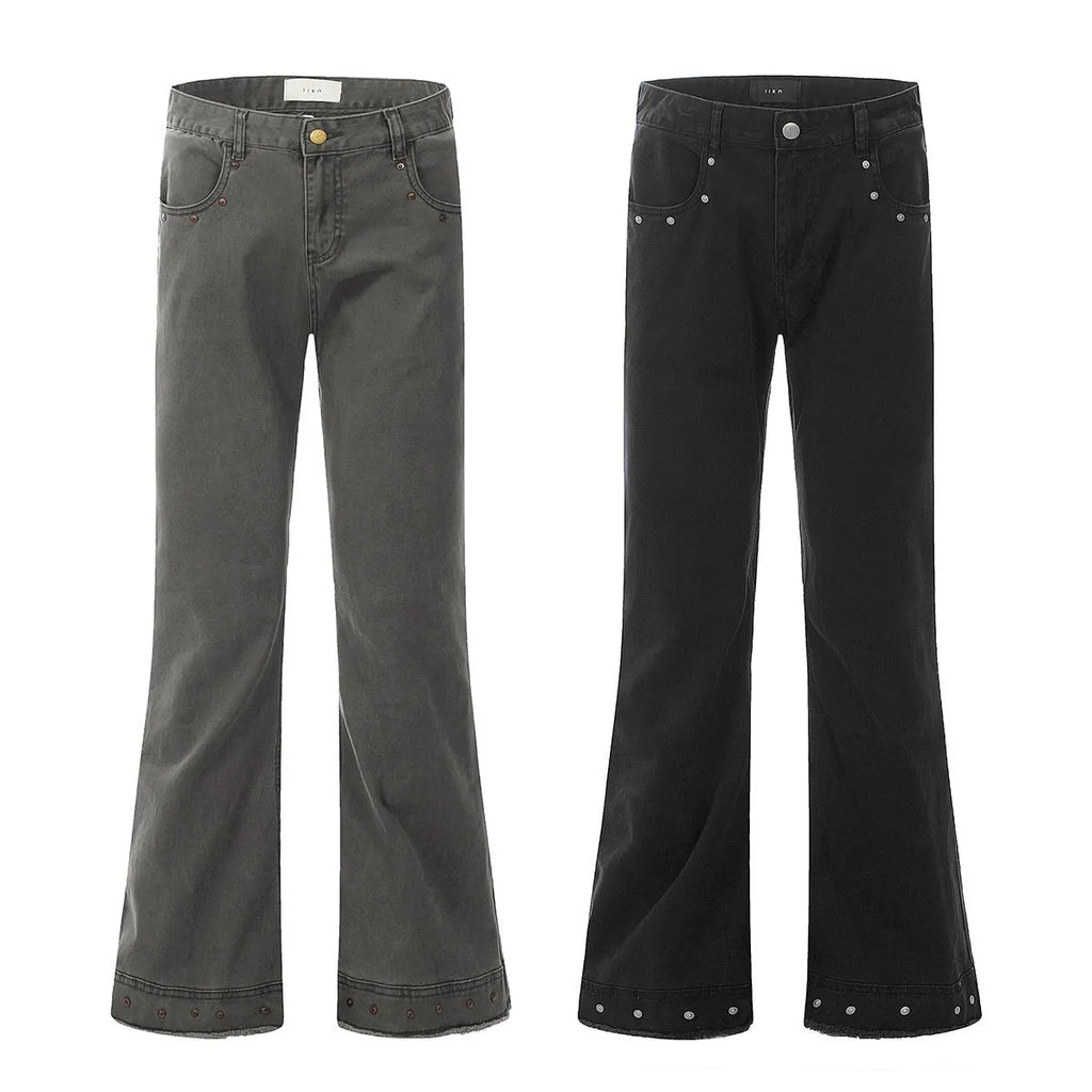 Black and grey green cotton retro skinny jeans with a straight leg and horn opening on a mid waist.