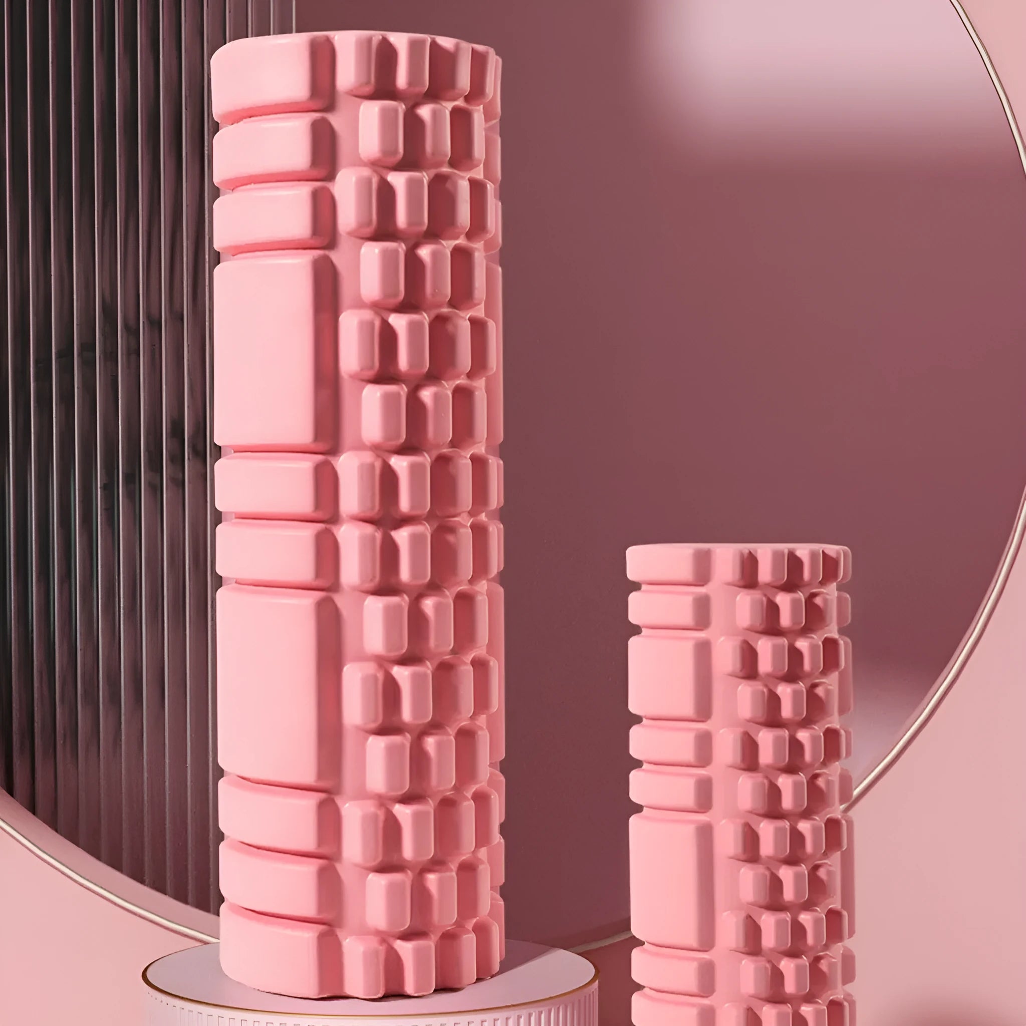 EVA foam fitness roller shown in various colours including black, pink, and blue.