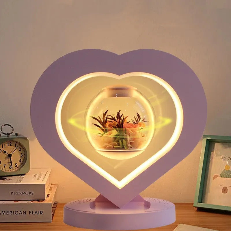 Pink preserved rose ornament in a decorative style, shown with optional base and bluetooth speaker features.