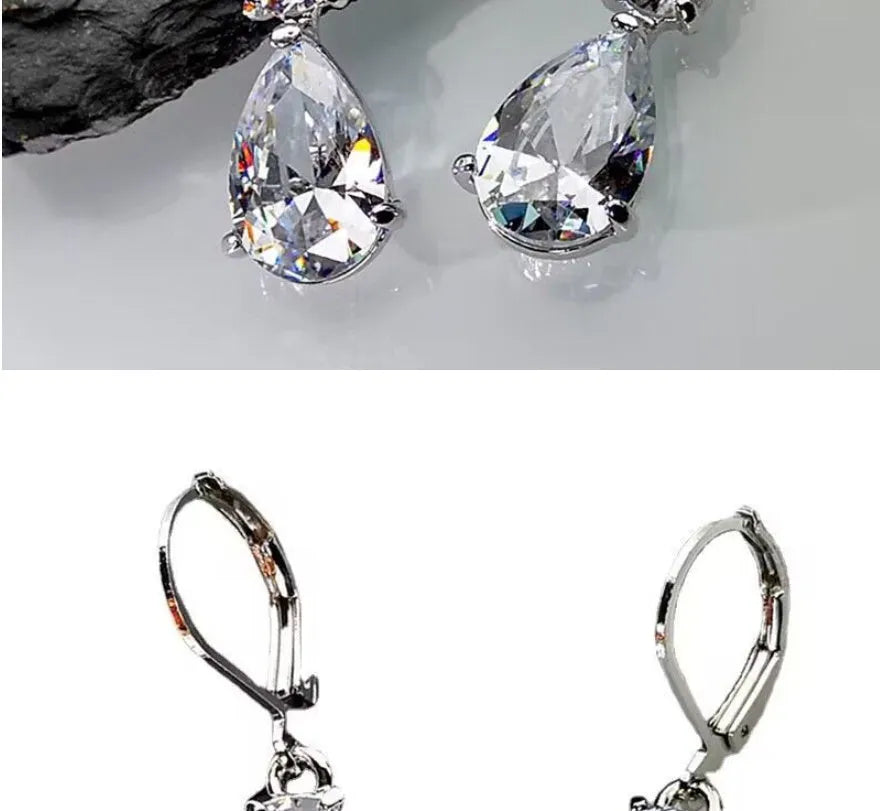 White gold drop-shaped long earrings with diamond finish on women