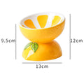 Ceramic raised cat feeding bowl with tilted design in orange colour pattern