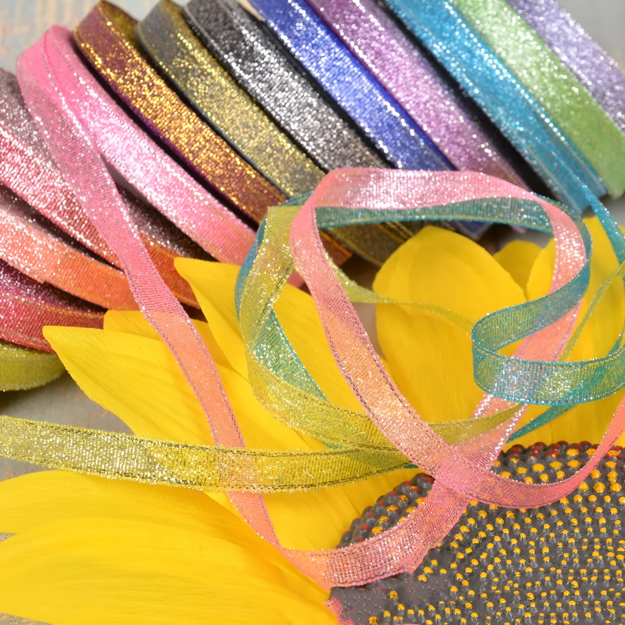 Colourful green onion pattern polyester ribbon spool with metallic gold or silver wire detailing.