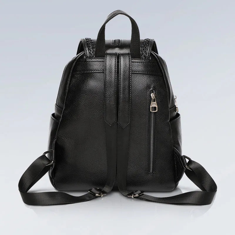 Blue genuine leather women's backpack with outer pocket and internal organiser compartments