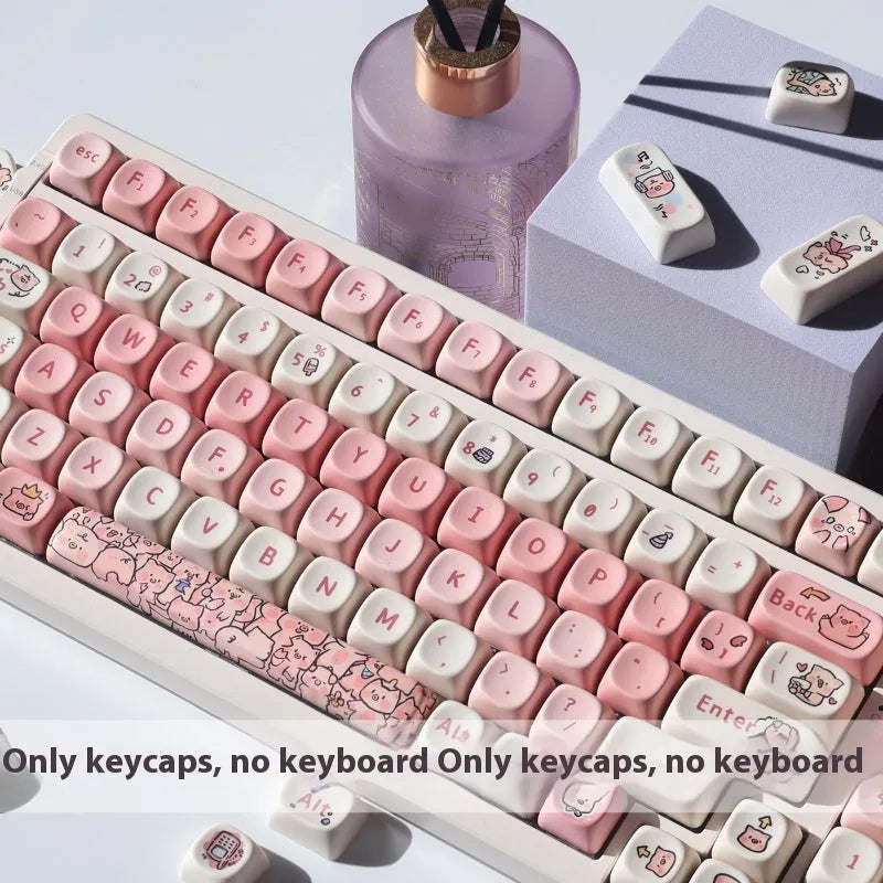 Close-up of a pink PBT mechanical keyboard key cap with a colourful Fragrant Pig cartoon design.