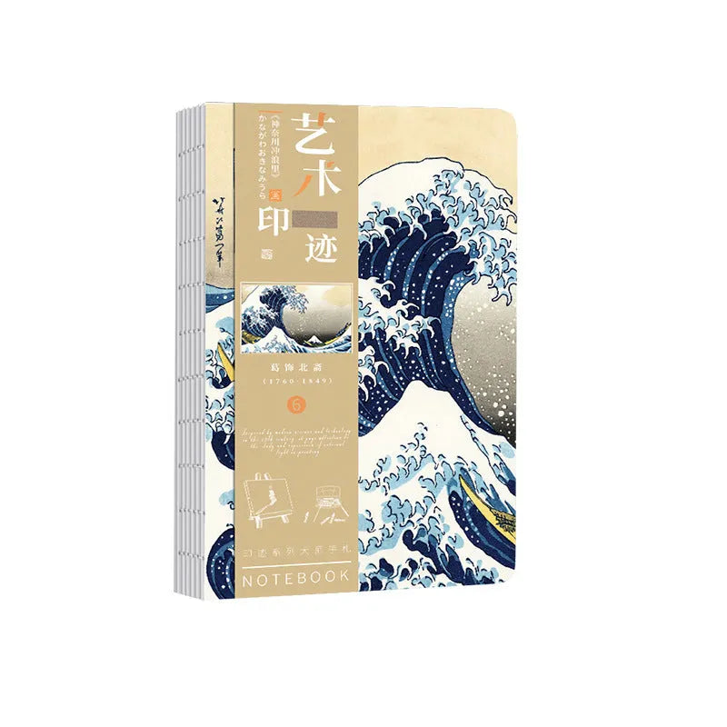 Ukiyo-e Kanagawa wave art cover hand ledger notebook open on a table.