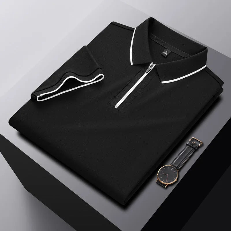 Man wearing a solid colour zip-front short sleeve polo shirt in long-staple cotton.