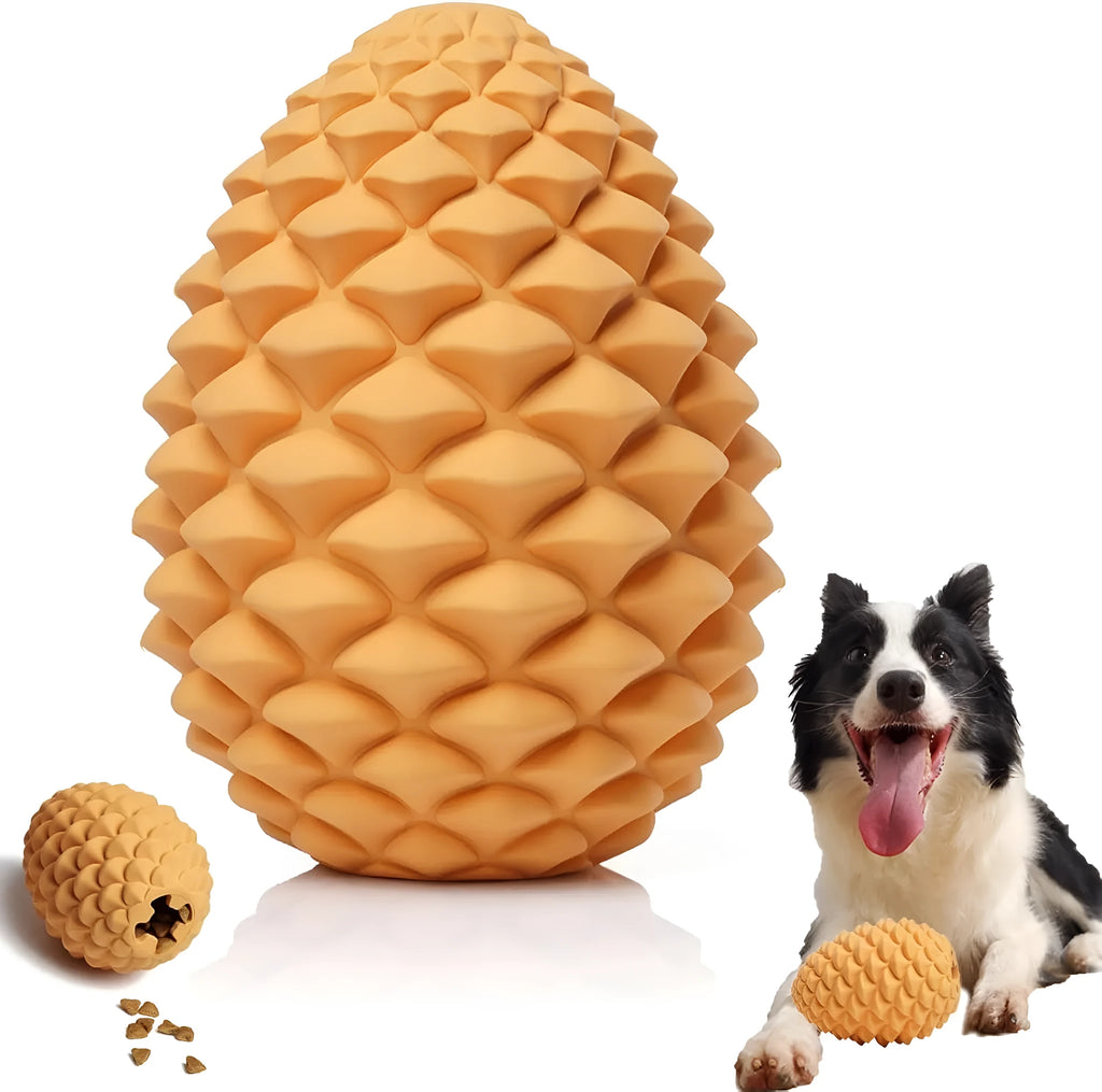 Yellow pine cone-shaped natural rubber dog chew toy with treat dispenser on a white background.