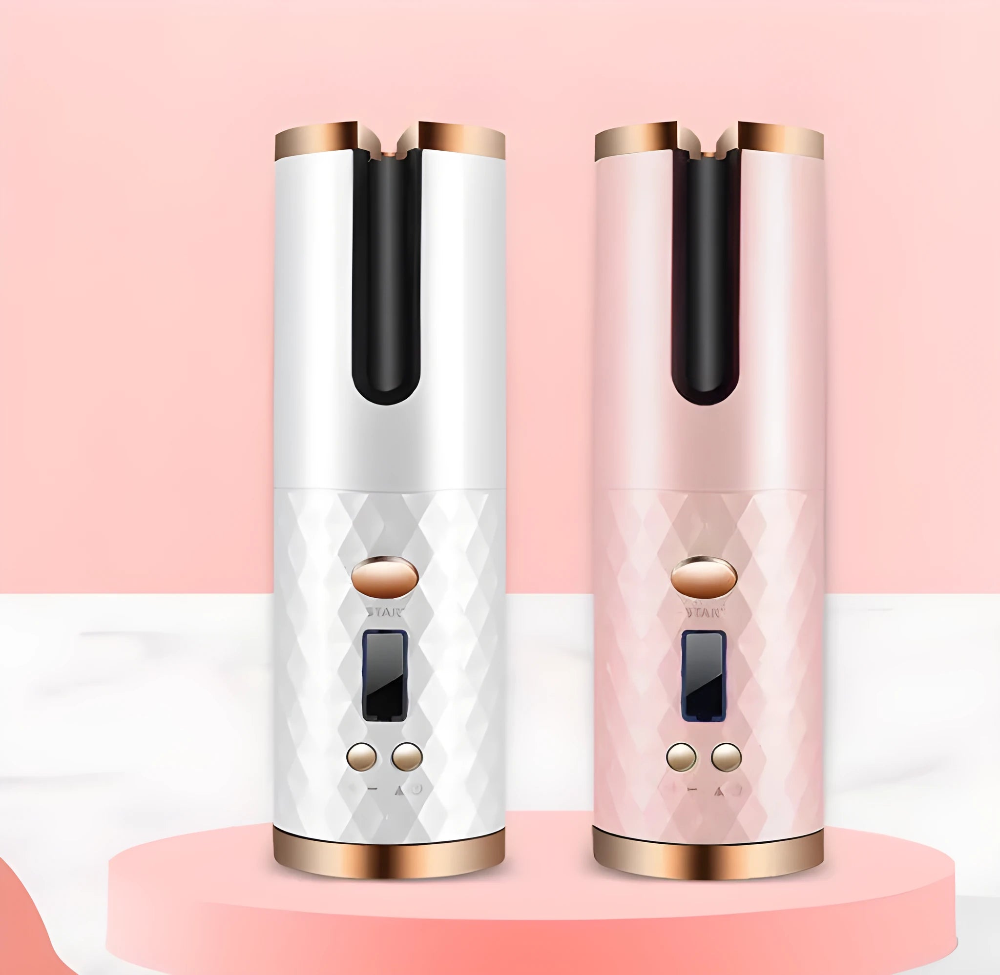 White automatic wireless curling iron with a gold ceramic barrel on a table next to a USB cable.