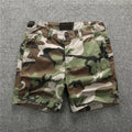 Men's green camouflage cotton workwear shorts with mid-waist design and zip fly placket