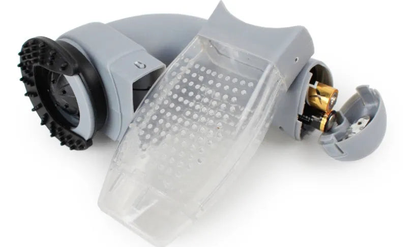 Grey handheld pet hair vacuum cleaner with soft rubber grooming brush head