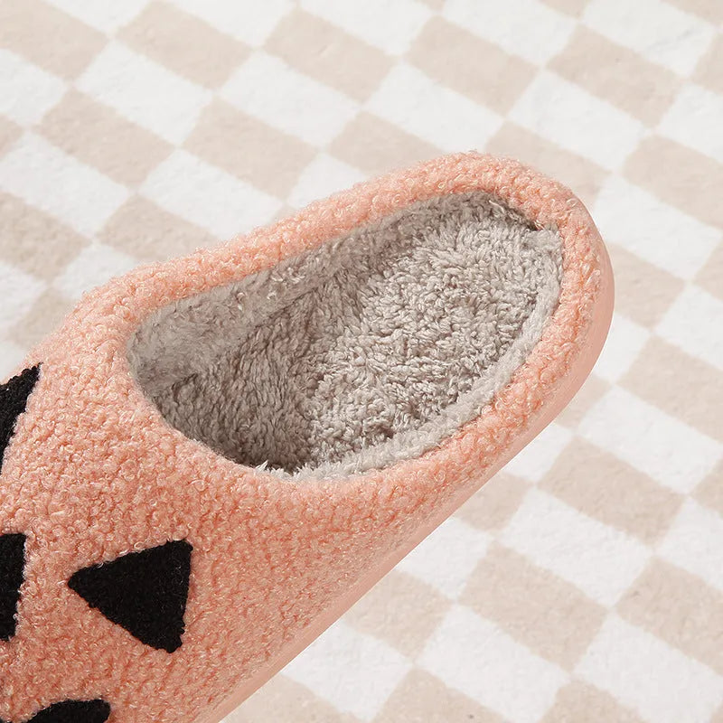 Halloween pumpkin cartoon thermal winter cotton slippers with suede upper, non-slip TPR sole, available in black and watermelon red