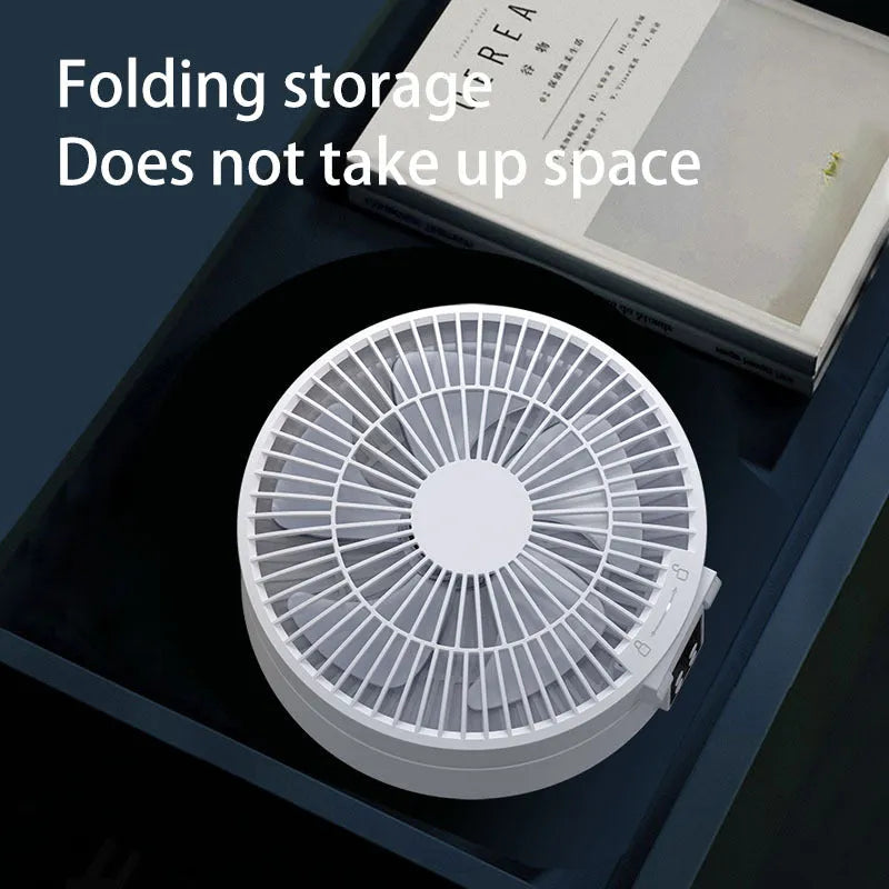White portable folding fan with remote control showing 90° angle adjustment and detachable cover