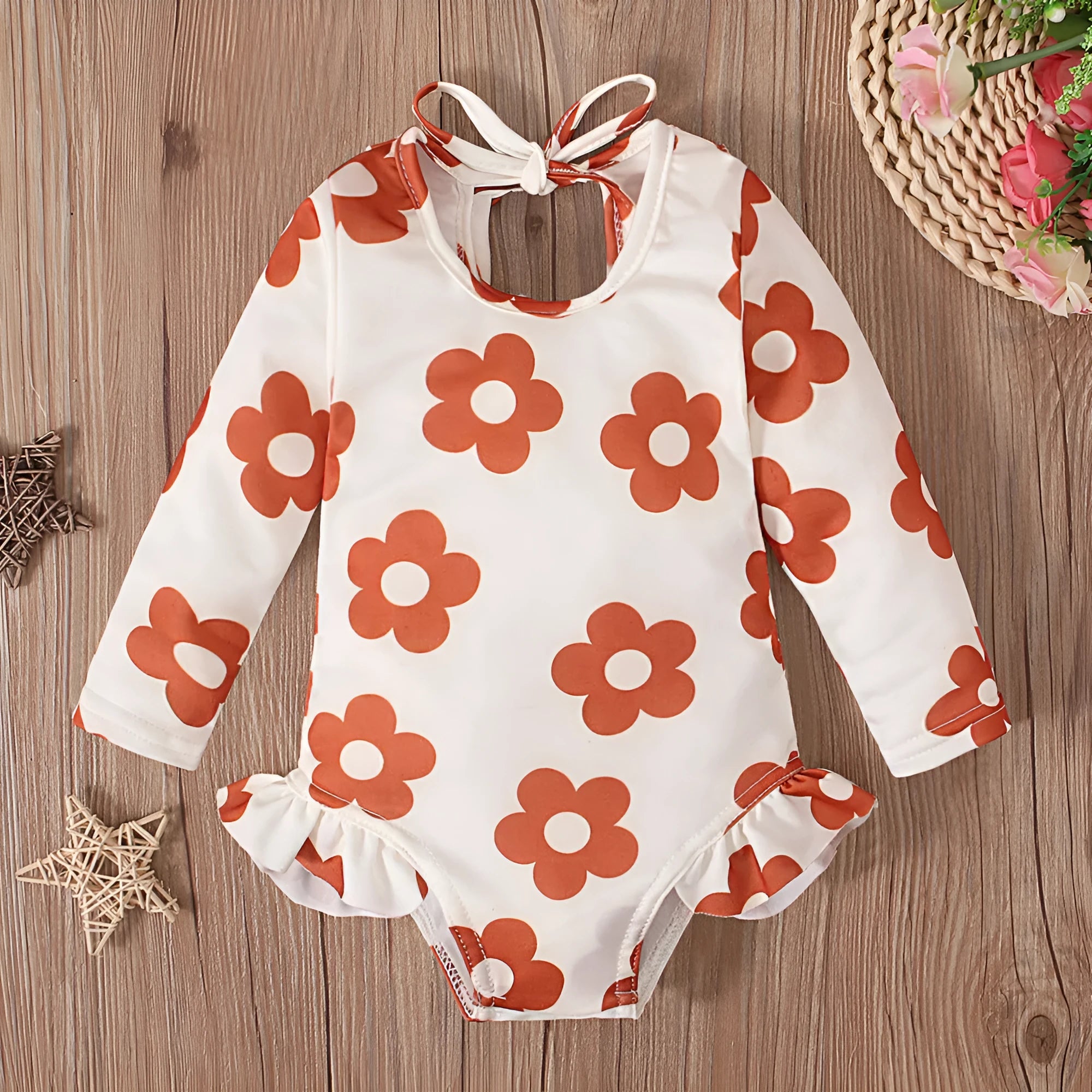 Girl's white floral print one-piece swimsuit with crew neck and open back design