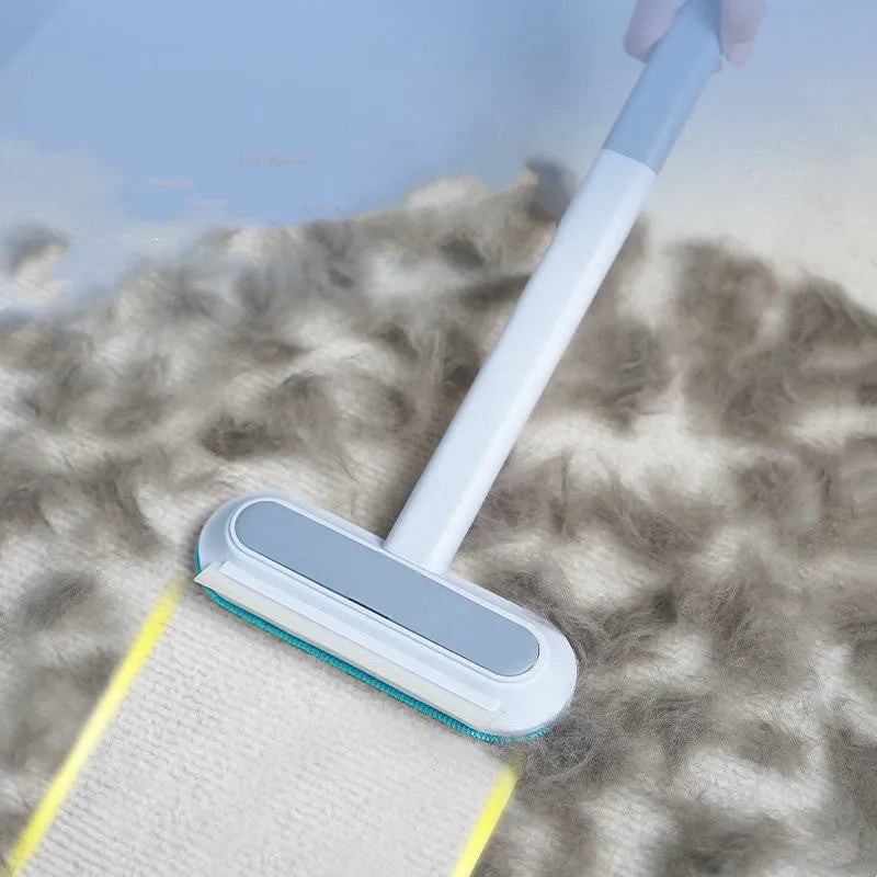 Multifunctional 4-in-1 screen cleaner and pet hair remover brush with flannel head and extension handle.