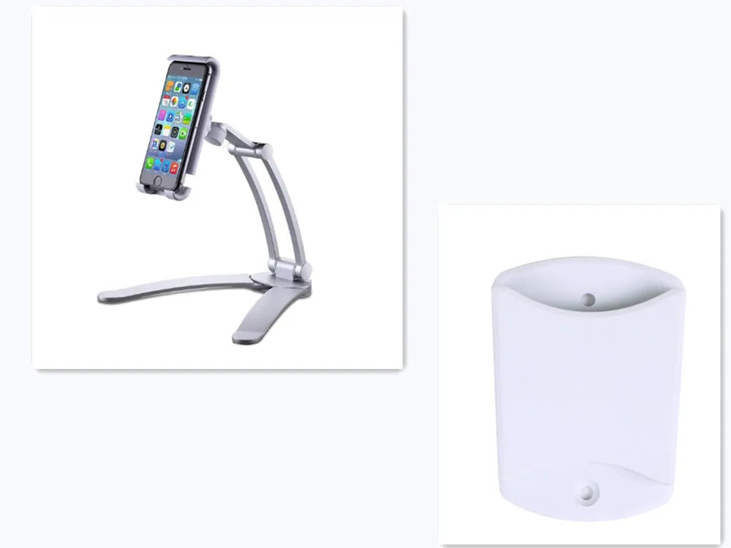 Silver aluminium alloy tablet stand with adjustable black clips holding a tablet, showing 360-degree rotation on a wooden desk.