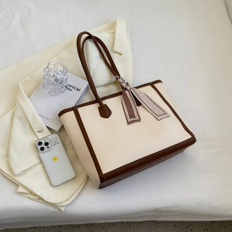 Soft PU leather commuter tote shoulder bag with open outer pocket and internal organisation