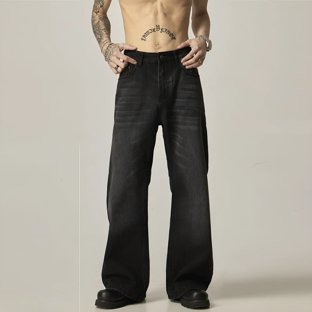 Black American retro loose straight jeans with zip fly opening on denim background