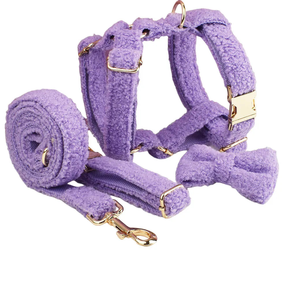 Purple cloth dog collar, leash, bow tie, and vest set for small dogs.