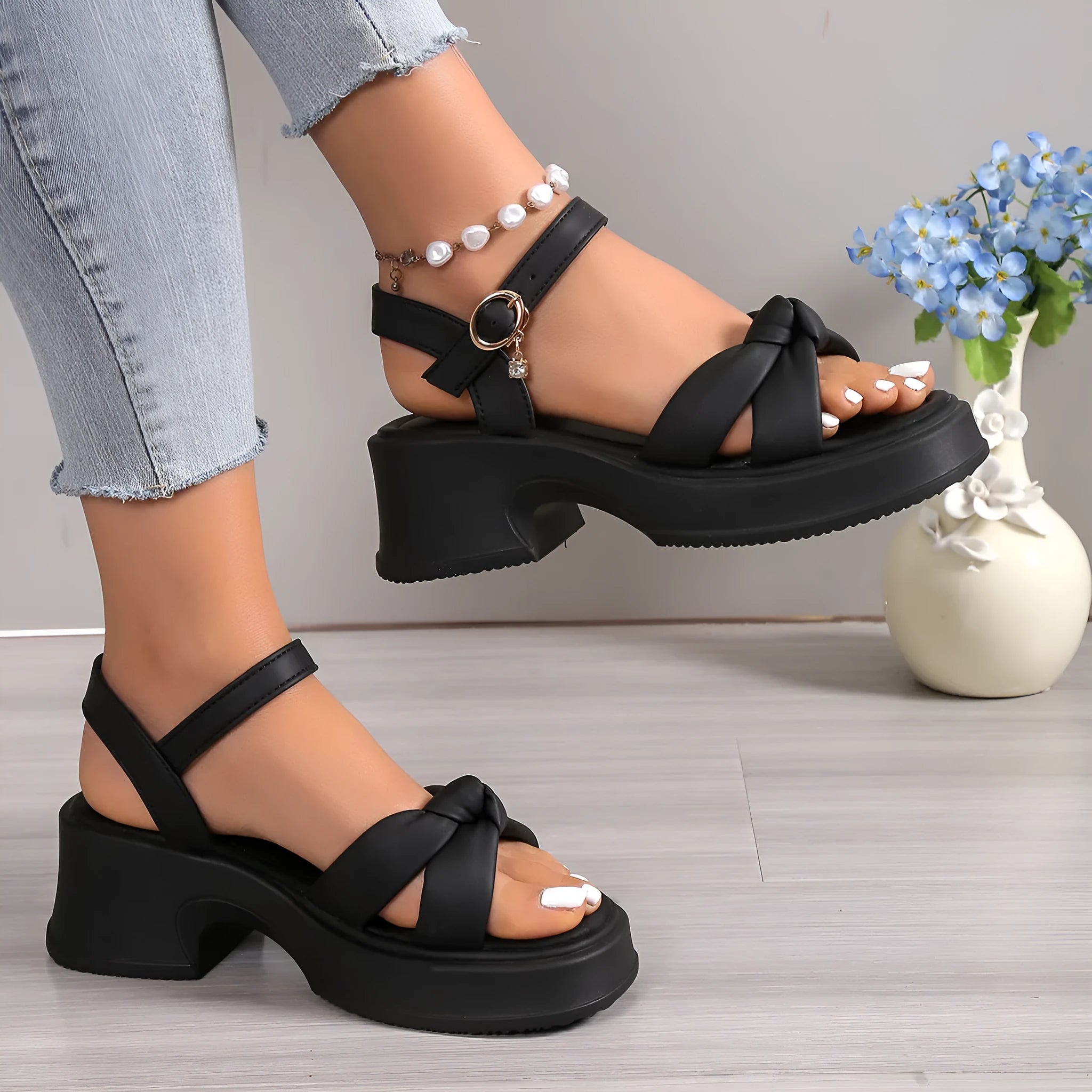 Black thick heel slippers with button fastening and rubber sole