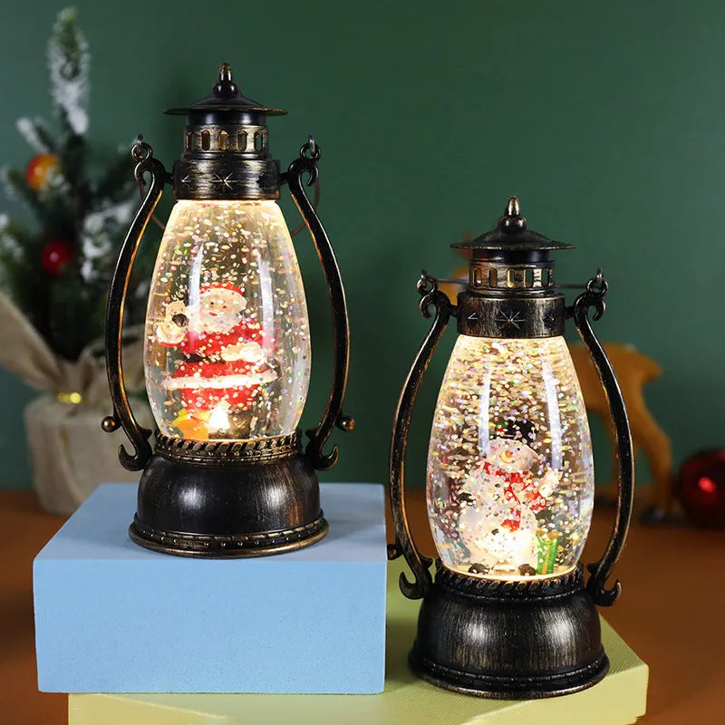 Clear plastic crystal ball LED portable oil lamp with a decorative snowman figure inside on a table.
