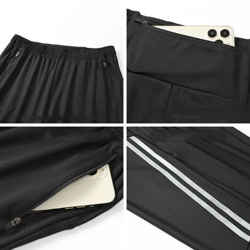 Men's black polyester running trousers with a mid waist and full-length leg.