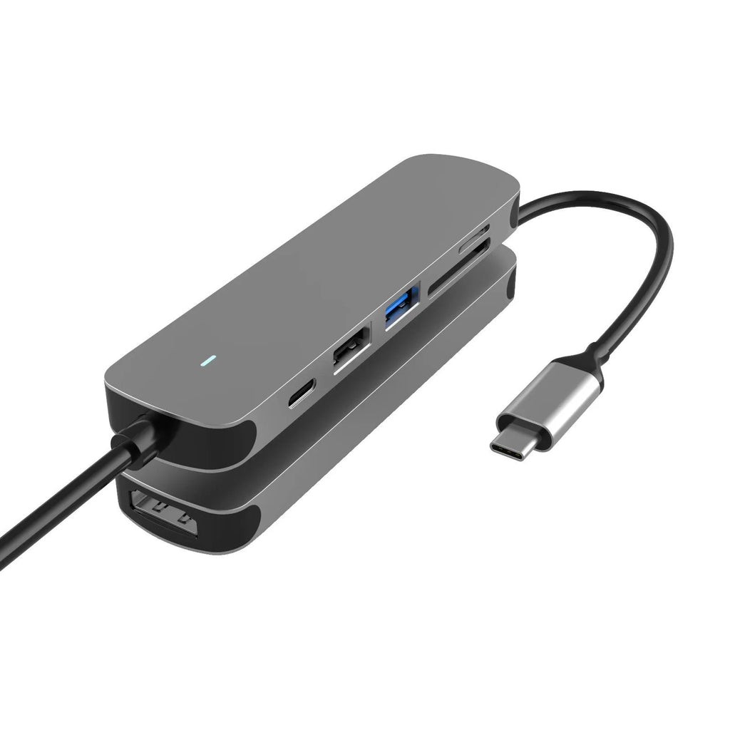 USB-C multi-function hub docking station with HDMI and wireless charging for notebook