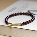Handmade natural garnet bracelet with a 6mm silver or copper bamboo joint centrepiece.